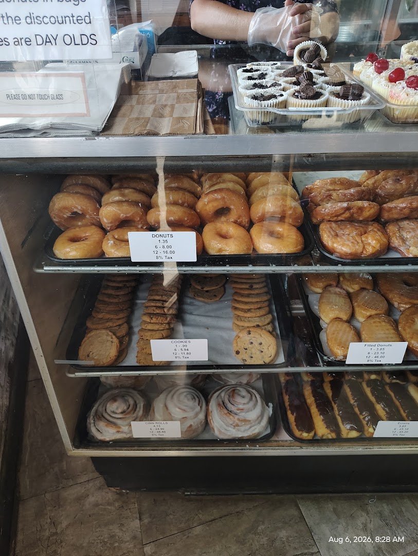 Fresh cakes in a small cafe case.