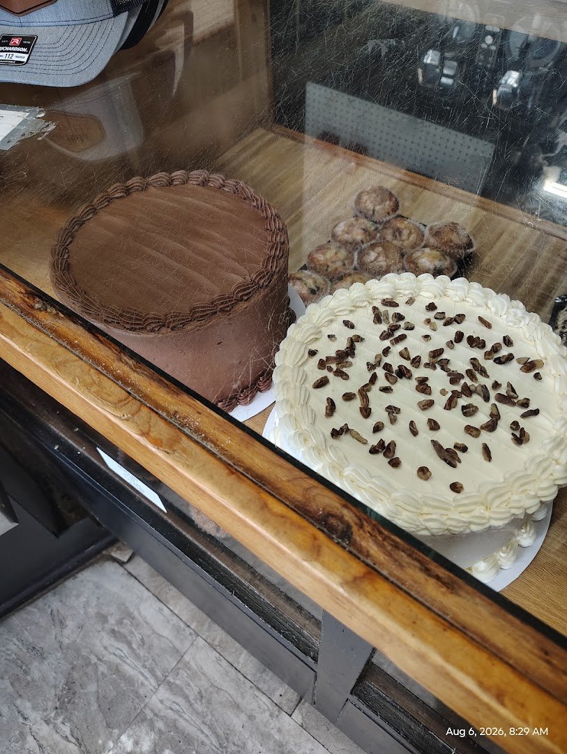 Fresh cakes in a small cafe case.